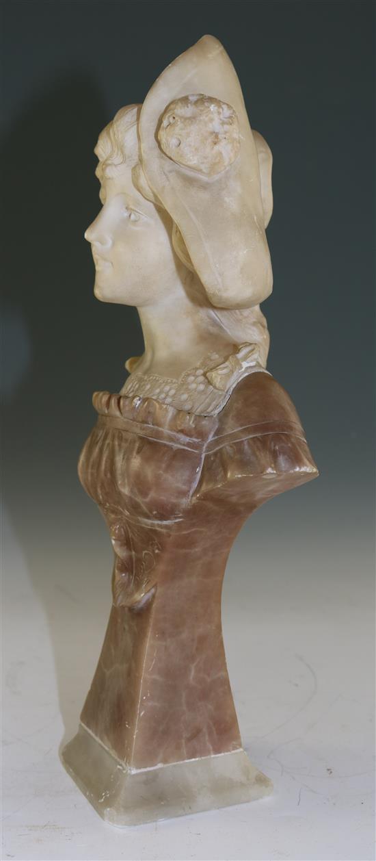 An Art Nouveau carved two colour alabaster bust of a young lady wearing a bonnet, 12in.